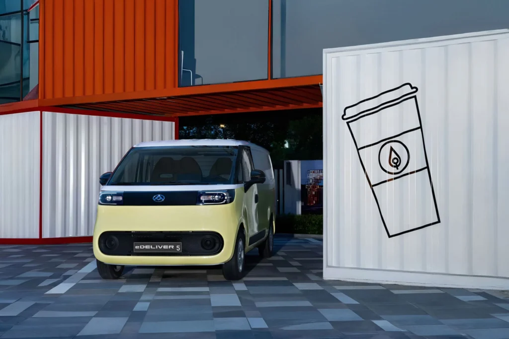 maxus edeliver5 pv l2h2 white yellow frontview parked under containers 2500x1667 car